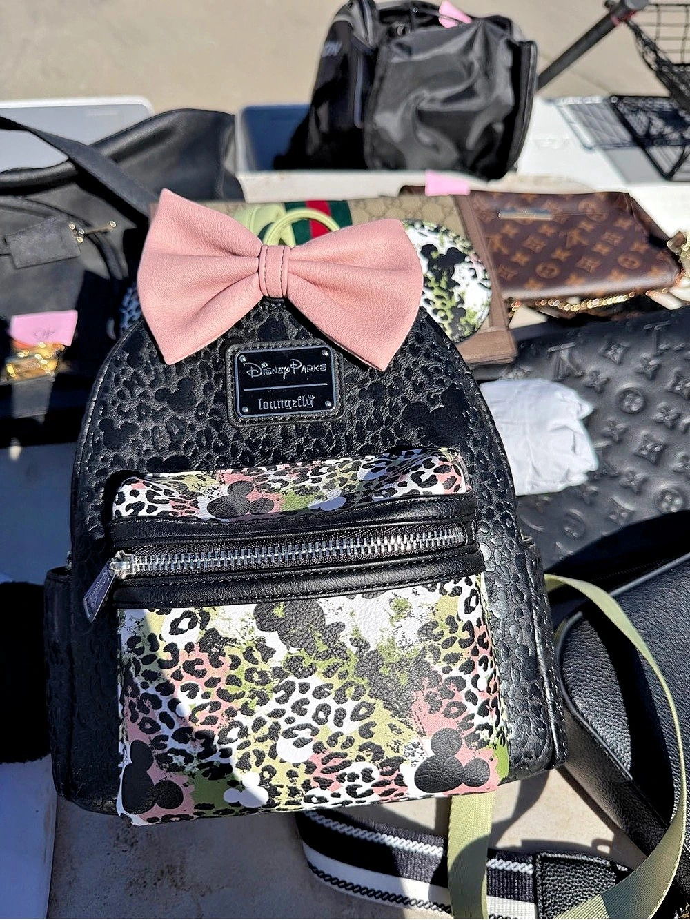 Disney Leopard Print Bow Backpack in Black & Pink Like New